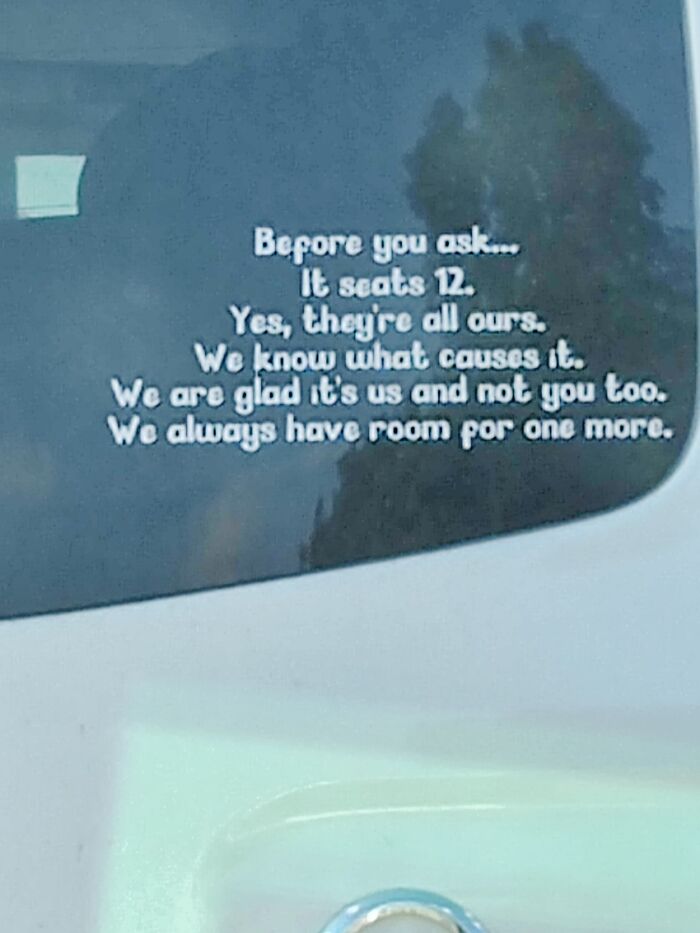 On The Back Window Of A Van Which Was In Front Of Me At A Red Light