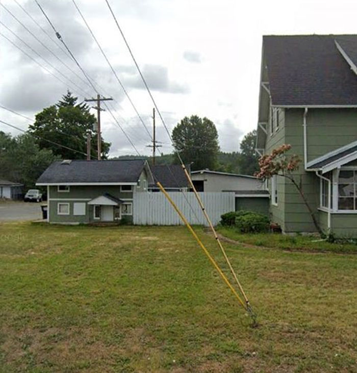 This Person Made The Back Of The Garage Look Like A Tiny House. It Makes Us Laugh Every Time We Drive By