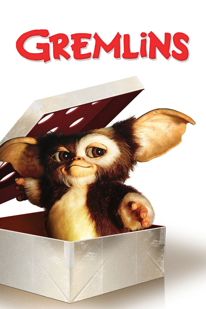 Cute Gremlin creature popping out of a box, representing a classic horror comedy character from popular horror comedies.