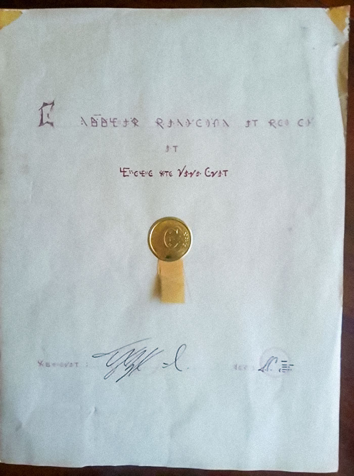 My Friend Found This Hidden In The Wall Of Her New House, Any Idea What It Says?