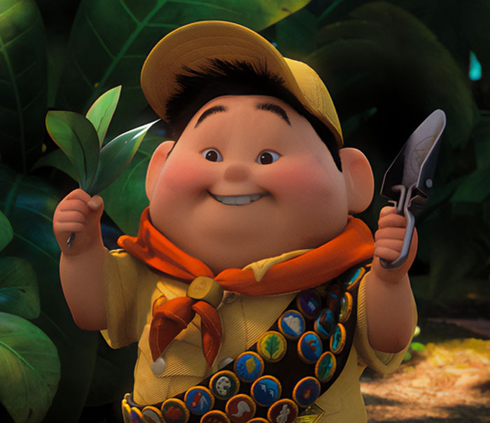 Russell Jordan holding a plant 