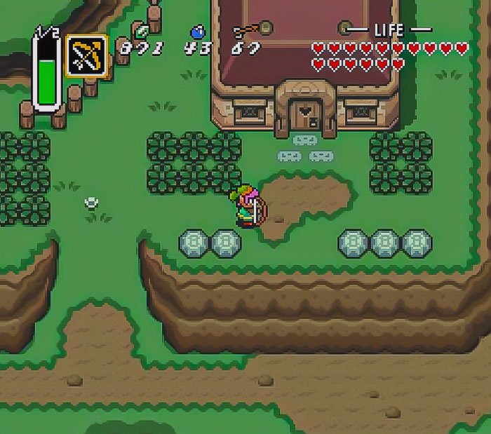 Retro video game scene with character exploring a green landscape near a house.