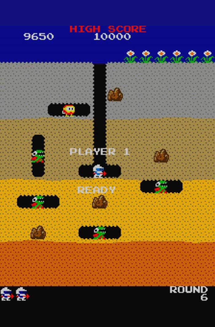 Retro video game gameplay screen showing a pixelated character navigating tunnels with enemies and scores displayed.