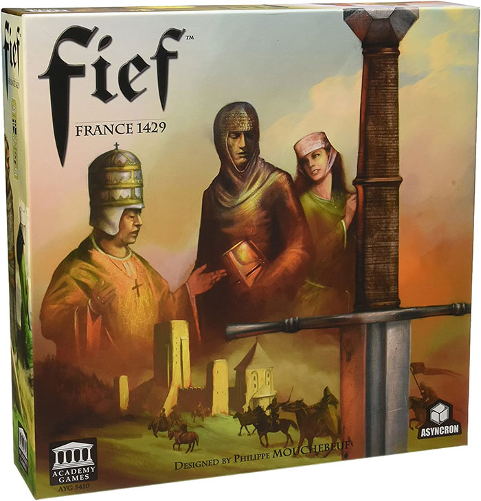 Strategy board game Fief France 1429 box featuring medieval characters and a large sword against a sunset background.