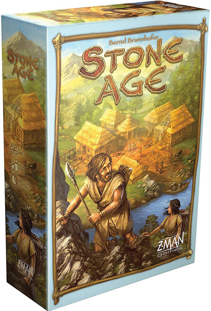 Stone Age strategy board game box showing prehistoric village and characters with spears in natural landscape setting.