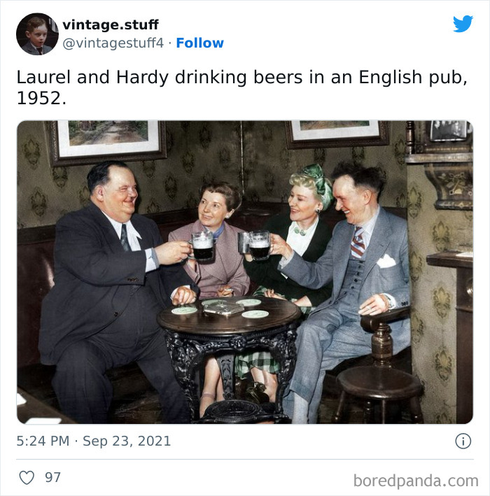 Laurel and Hardy drinking beers in an English pub, a colorized photo that makes history look stunning from 1952.