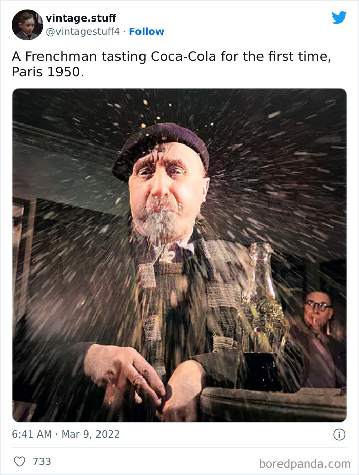 Colorized photo of a Frenchman in 1950 Paris reacting to tasting Coca-Cola for the first time, capturing a historic moment.