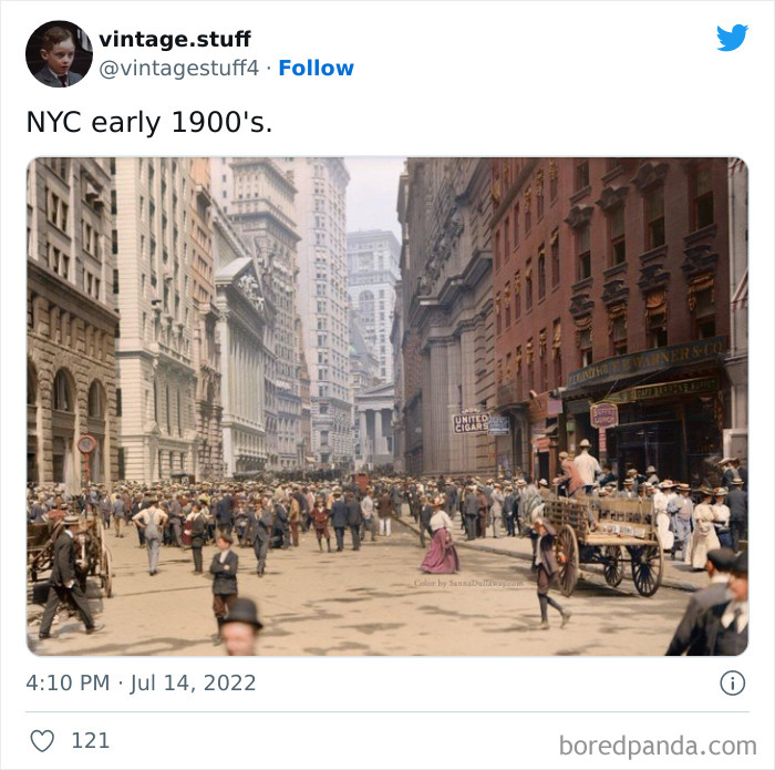 Colorized photo of a bustling New York City street in the early 1900s showcasing historical urban life.