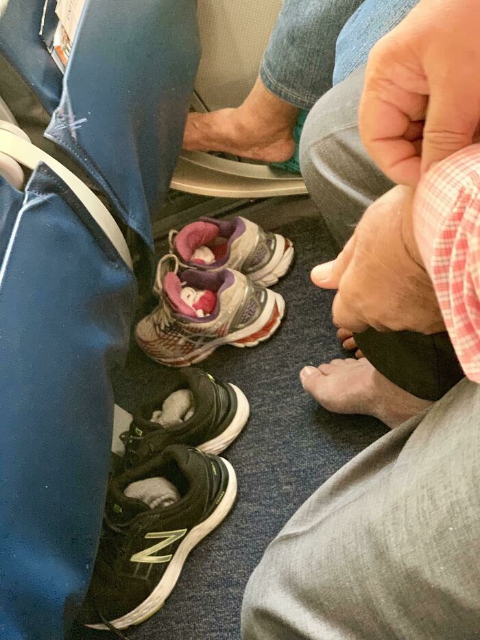 My Seat-Mates For An 11-Hour Flight. We Are Still On The Runway