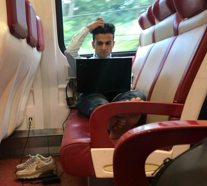 Guy Decides It’s Fine To Air Out His Stinky Feet Across Three Seats On A Packed Train