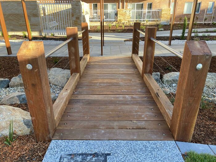 A Beautiful Hardwood Bridge We Built At Work. Wheelchair Accessible. Comes With A Nice Steel Pole Almost Smack Bang In The Middle. This Is What Happens When Architects Refuse To Change Their Plan Even When Common Sense Says Let’s Move The Bridge