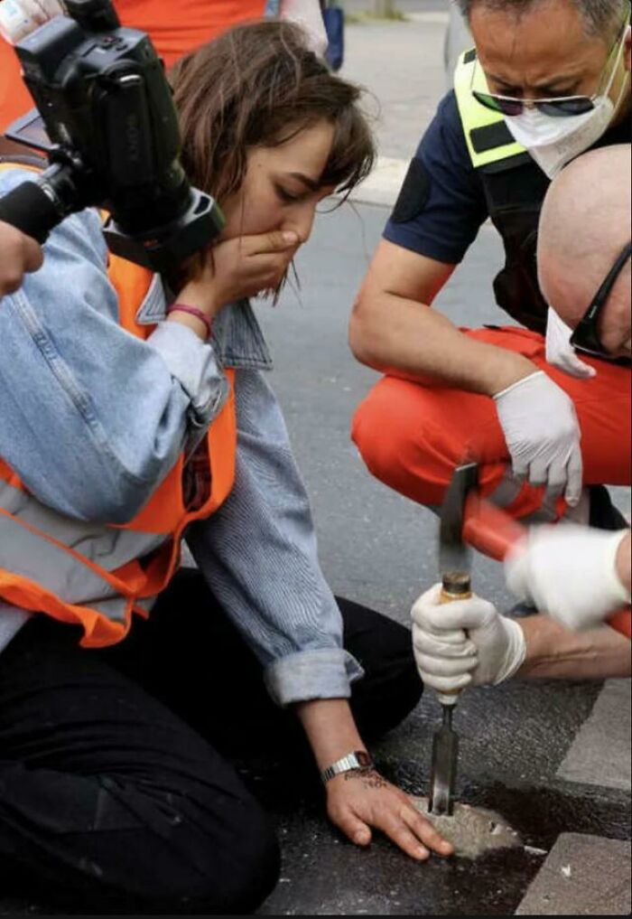 Glued Herself To The Street With Fast-Drying Concrete