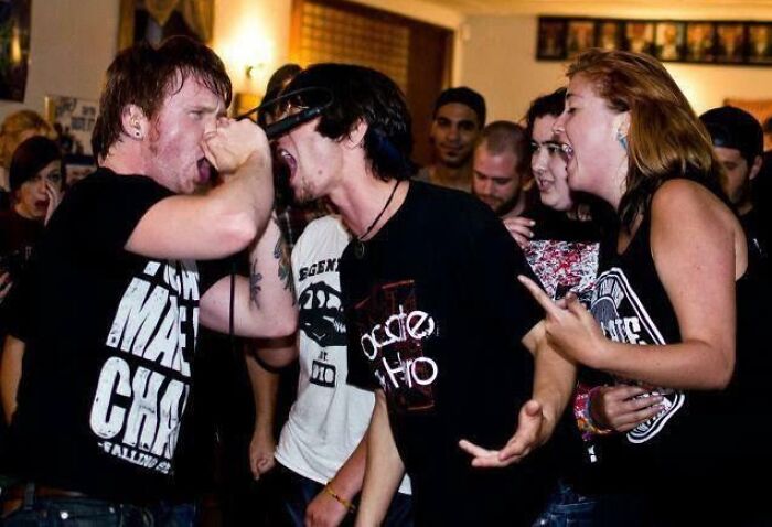 On The Left, Behind A Girl Is My Long Term Boyfriend. All The Way To The Right, With The Long Index Finger, Is Me. This Was Taken Five Years Before We Met