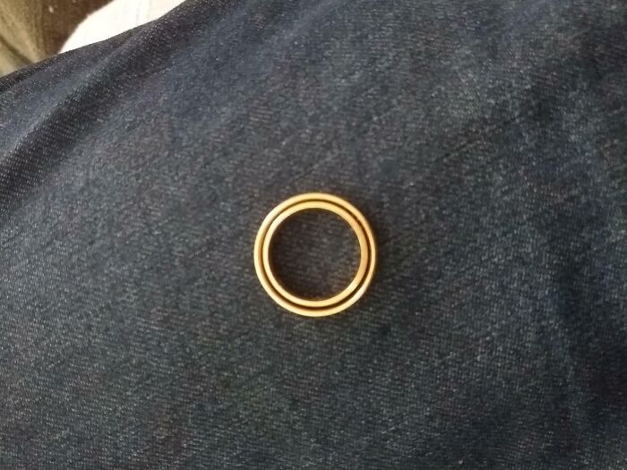 My Wife's Wedding Ring Fits Perfectly Inside Mine