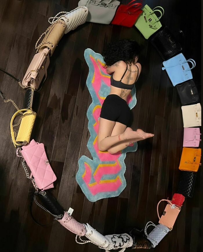 Danielle Bregoli Lying Surrounded By Expensive Brand Purses