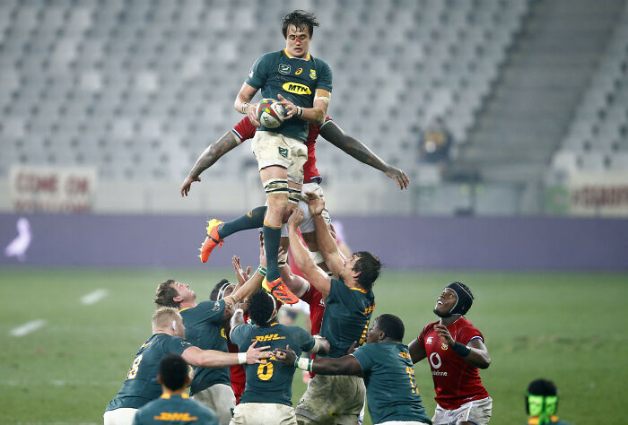 Rugby players in action during a lineout, capturing one of the best moments in sports nominated by photography awards.