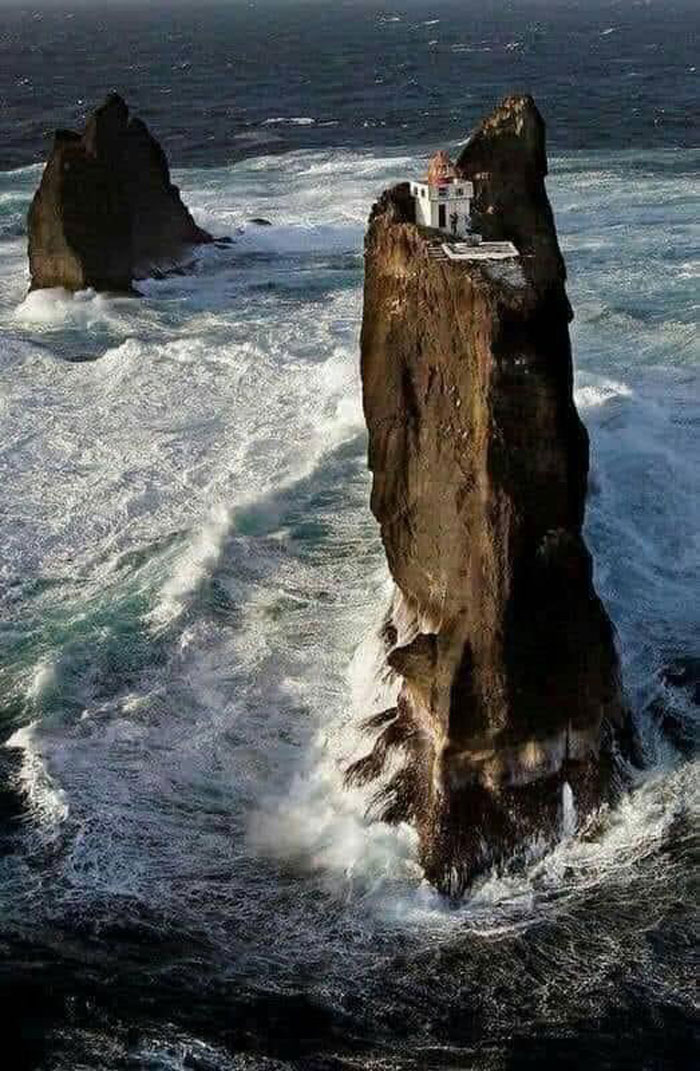 The Most Isolated Lighthouse In The World, Þrídrangaviti Lighthouse, Perched Atop A Rock Pillar In The Westman Islands, Off The Coast Of Iceland