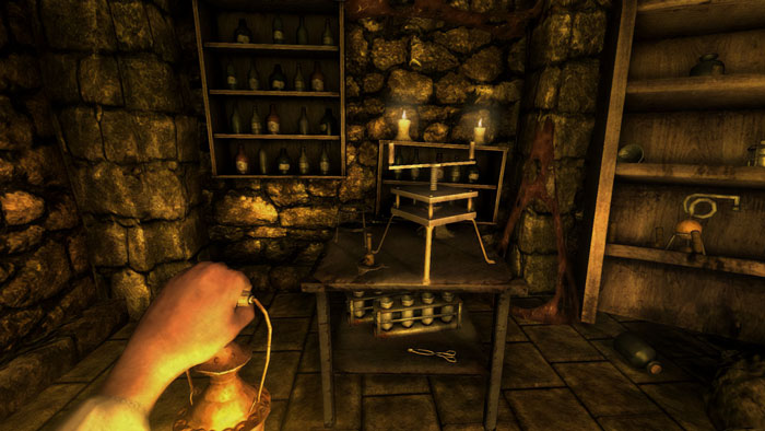 First-person view of a player holding a lantern in a dimly lit room with alchemy tools in an indie game environment.