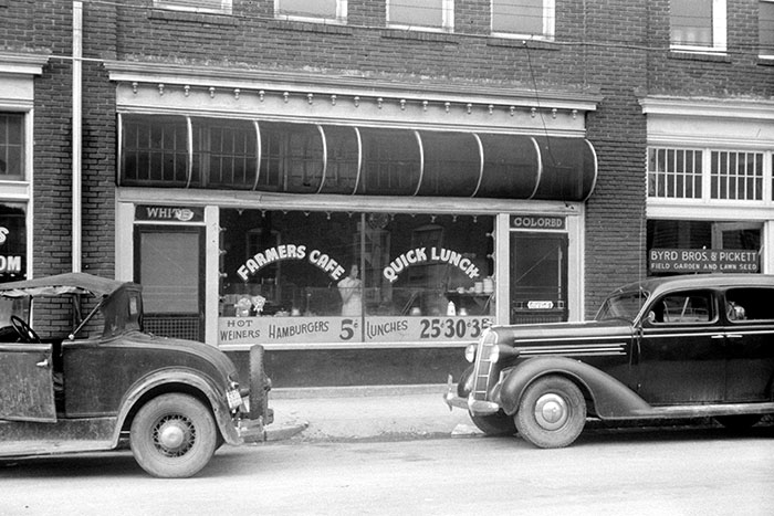 A Cafe Near The Tobacco Market, Durham, North Carolina. Separate Doors For "White" And For "Colored"