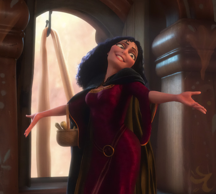 Mother Gothel wearing a dark cape 