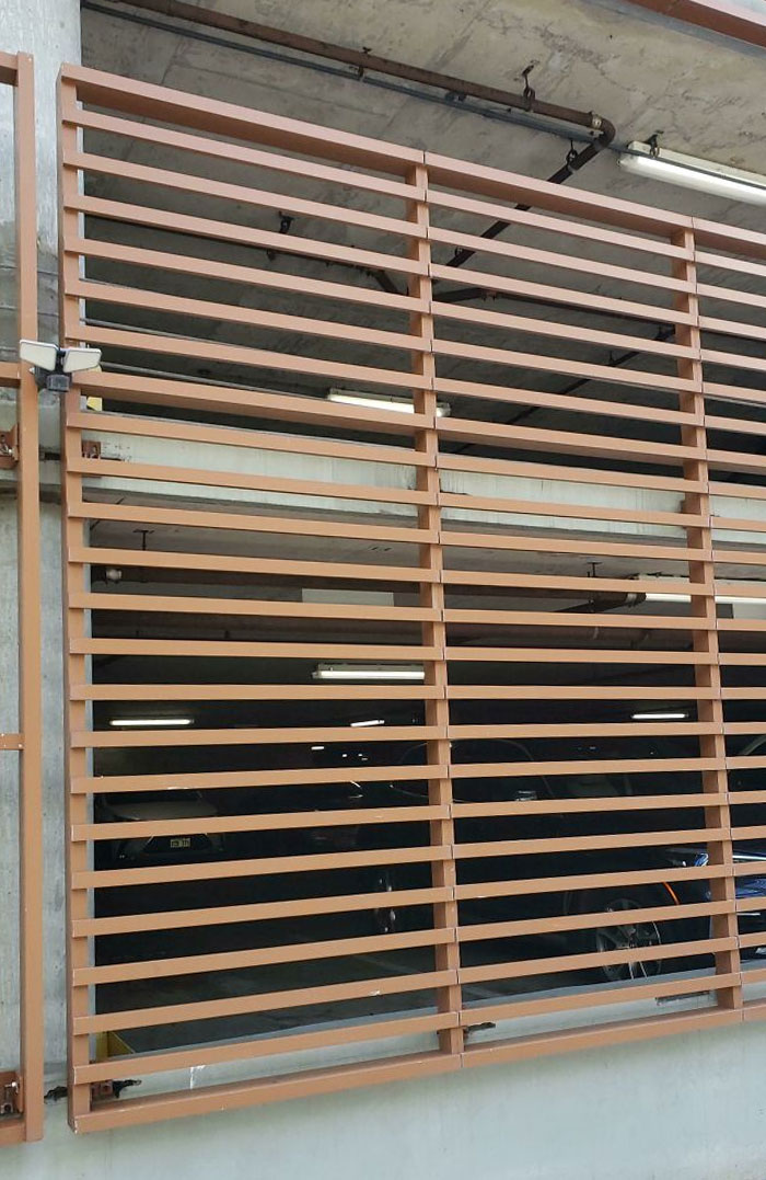 "Secure" Parking Lot Has Horizontal Bars A Child Could Climb