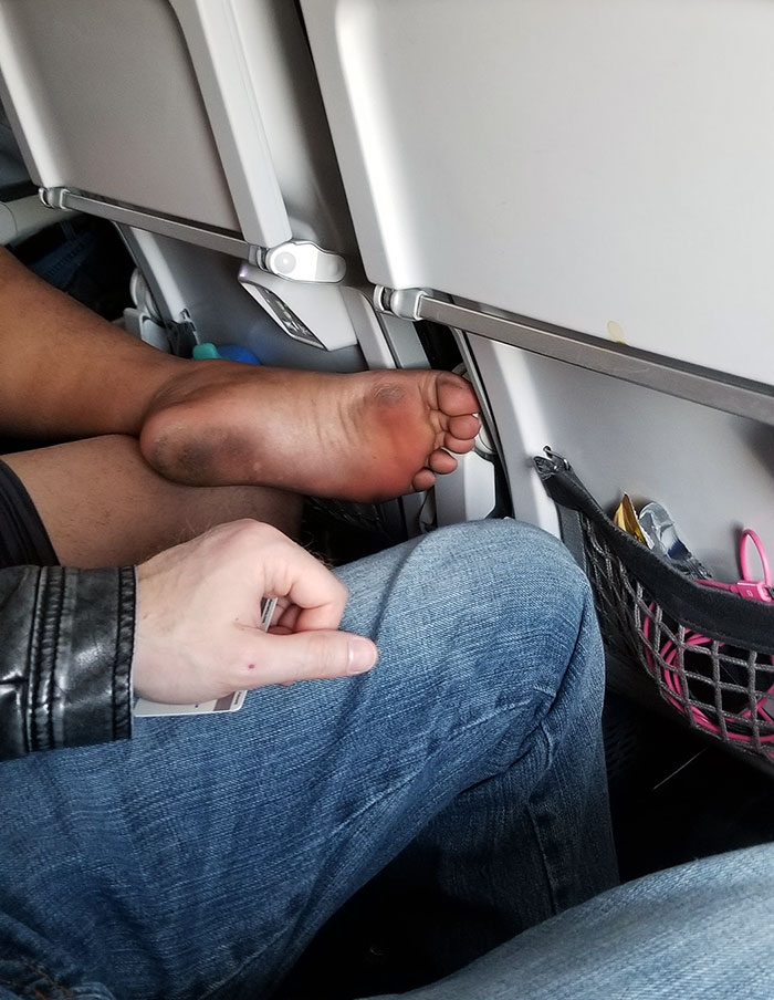 Nastiest Passenger Award Goes To This Guy. His Child Also Proceeded To Run Up And Down The Isle Screaming