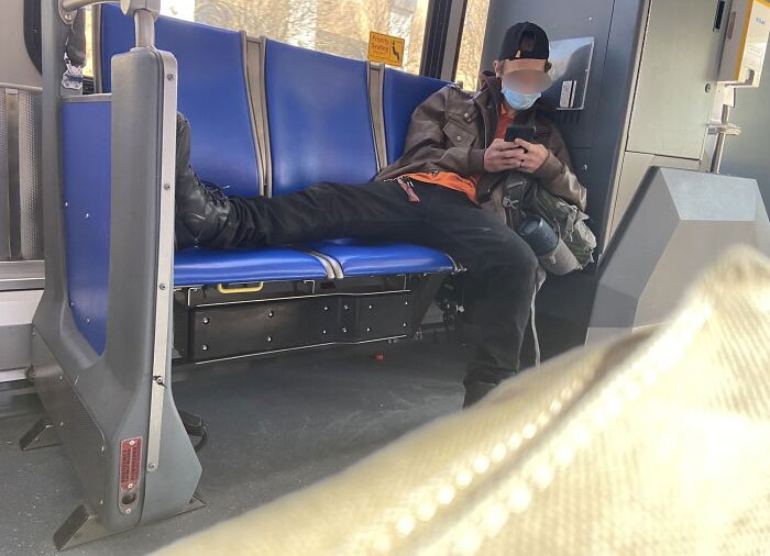 This Guy On My Bus To Work Sat Like This In The Elderly/Disabled Priority Section And Was Playing His Crappy Music
