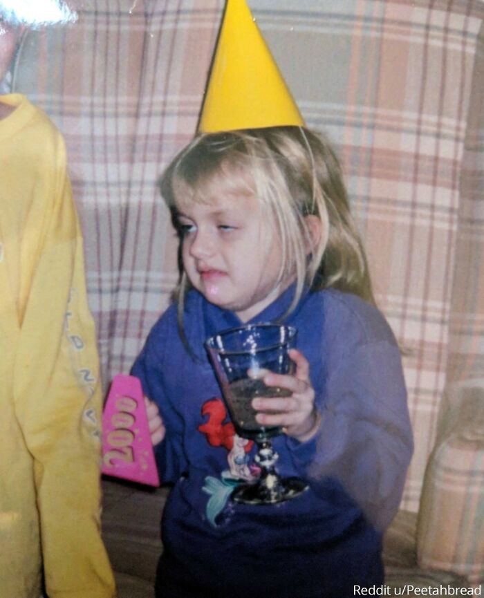 "My All Time Favorite Picture Of My Sister. She Was 6, Tired, And Had Just Tried Sparkling Grape Juice. Not A Fan"