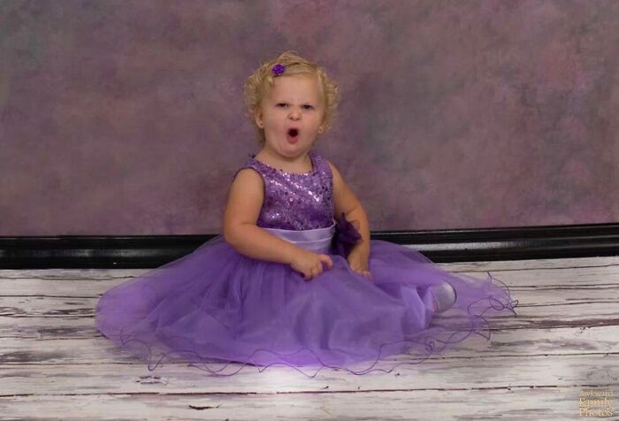 “Our Daughter Would Not Cooperate For Her Photos. She Was Doing Everything But Smiling. Here She Is Getting Ready To 'Hulk' Out”