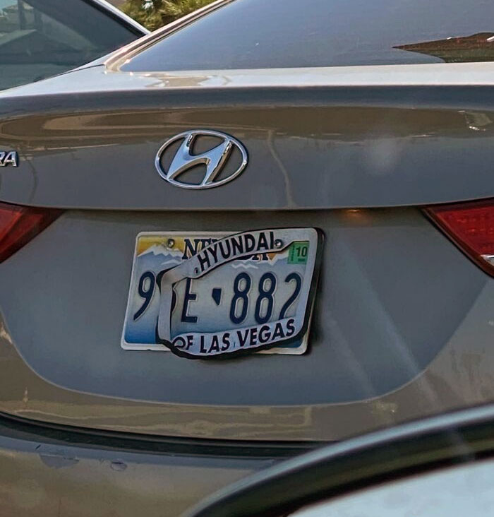 A License Plate Frame That Melted From The Heat (Las Vegas, NV)