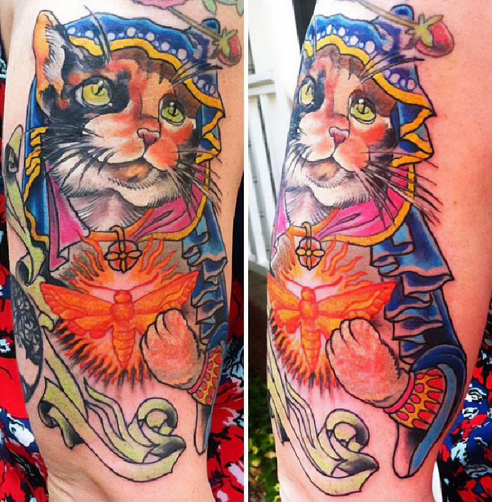 Colorful pet tattoo of a cat in ornate attire, celebrating human-animal bond with vibrant details.