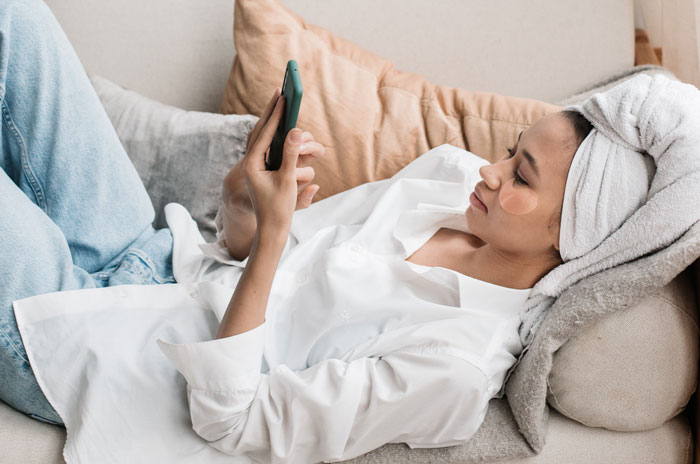Woman relaxing on the couch after shower