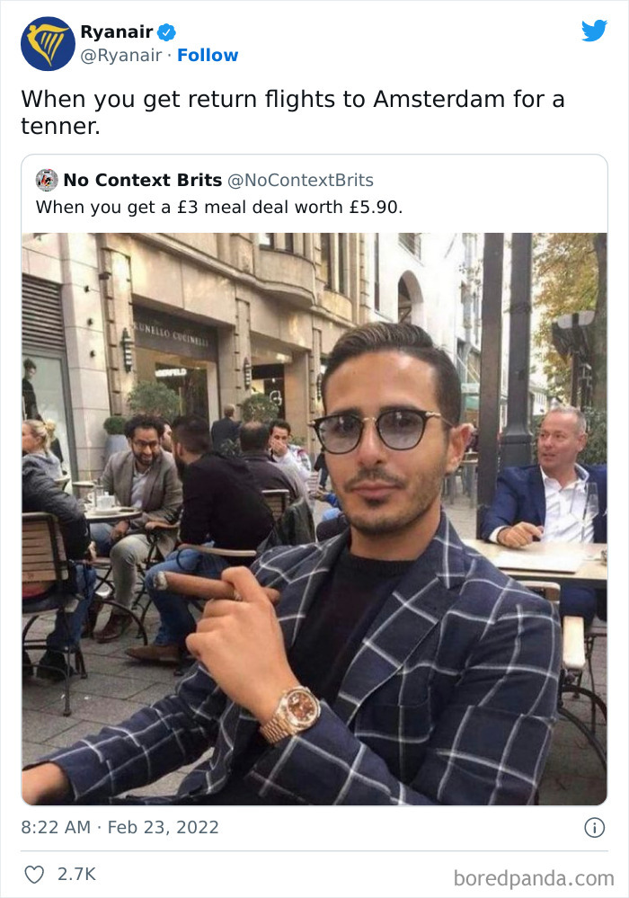 Man in sunglasses and checked blazer smoking cigar outdoors, a popular example of Ryanair savage roasts from social media.