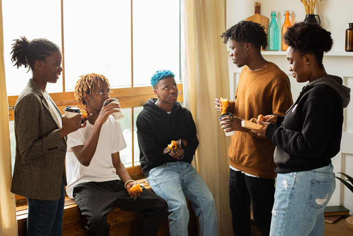 Friends eating and talking