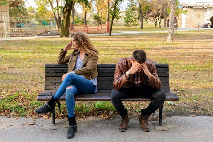 Woman and man argue in the outside