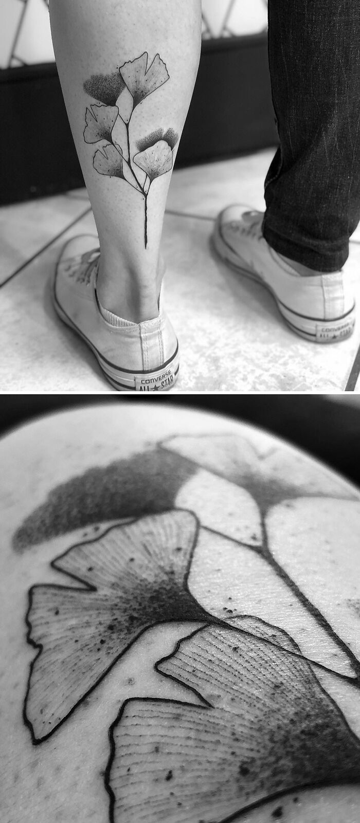 Black and white botanical calf tattoo showcasing artistic leaf design.