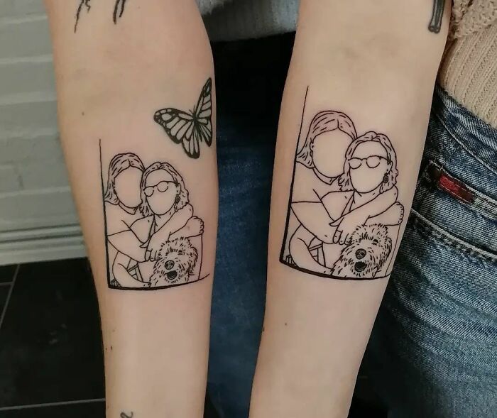 Matching best friend tattoos on arms showing a line drawing of two people hugging with butterfly nearby.