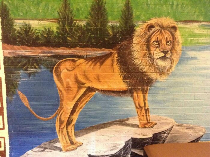 In A Mexican Restaurant In Ky. He Had A Fisherman Next To Him, For Some Reason. Look At His Human Knees And Toes!