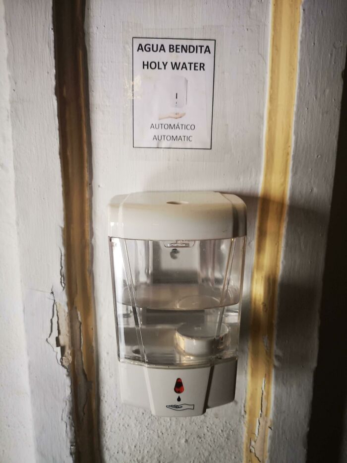 Automated Holy Water Dispenser Seen In A Church In Spain