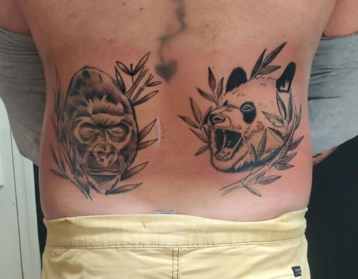 Realistic gorilla and panda tattoos on back, showcasing simple animal designs.