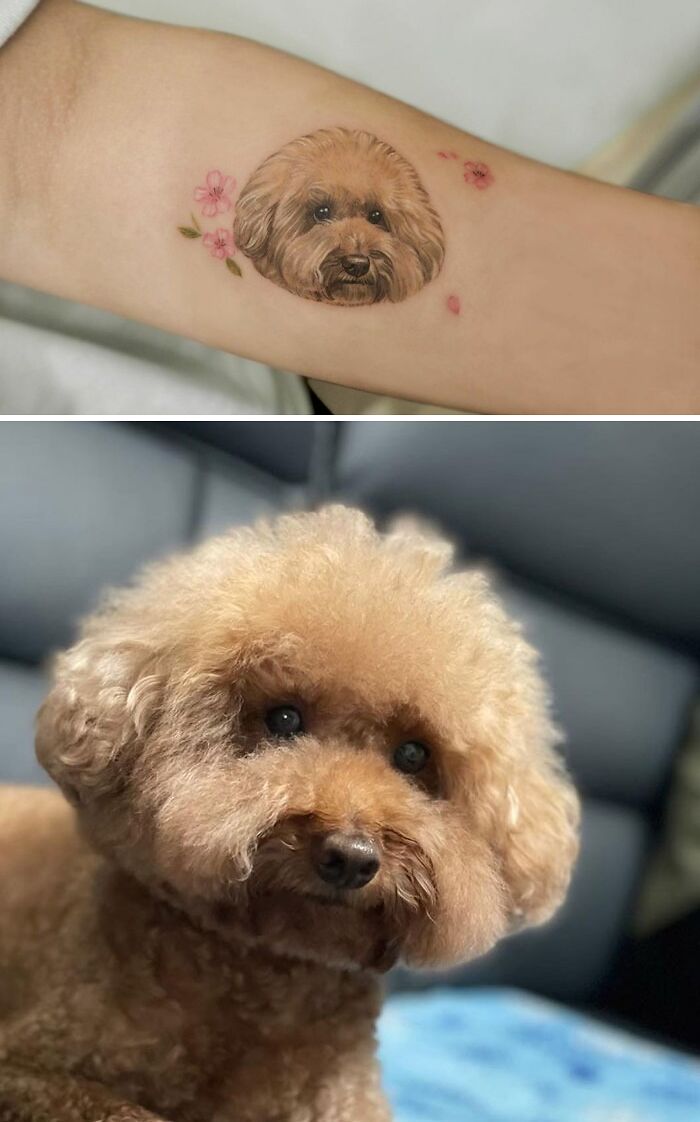 Pet tattoo of a fluffy brown dog with flower accents on an arm, celebrating furry friends.