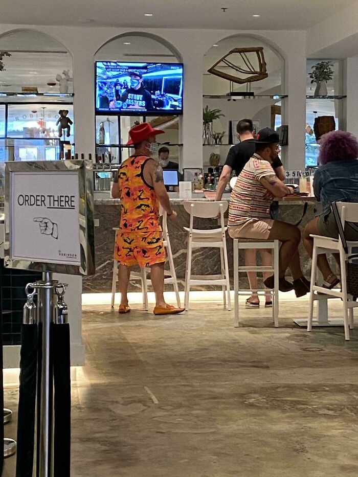 Found This Creature At A Coffee Shop. Straight Out Of Gta With A Bright Red Cowboy Hat