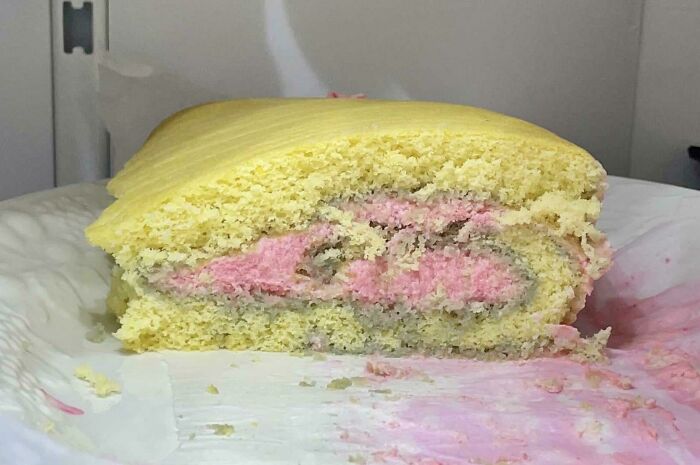 My Swiss Roll. It Cracked, Looks More Like A Flattened Loaf, And The Filling Is Turning The Sponge Gray. But Tastes Sublime!