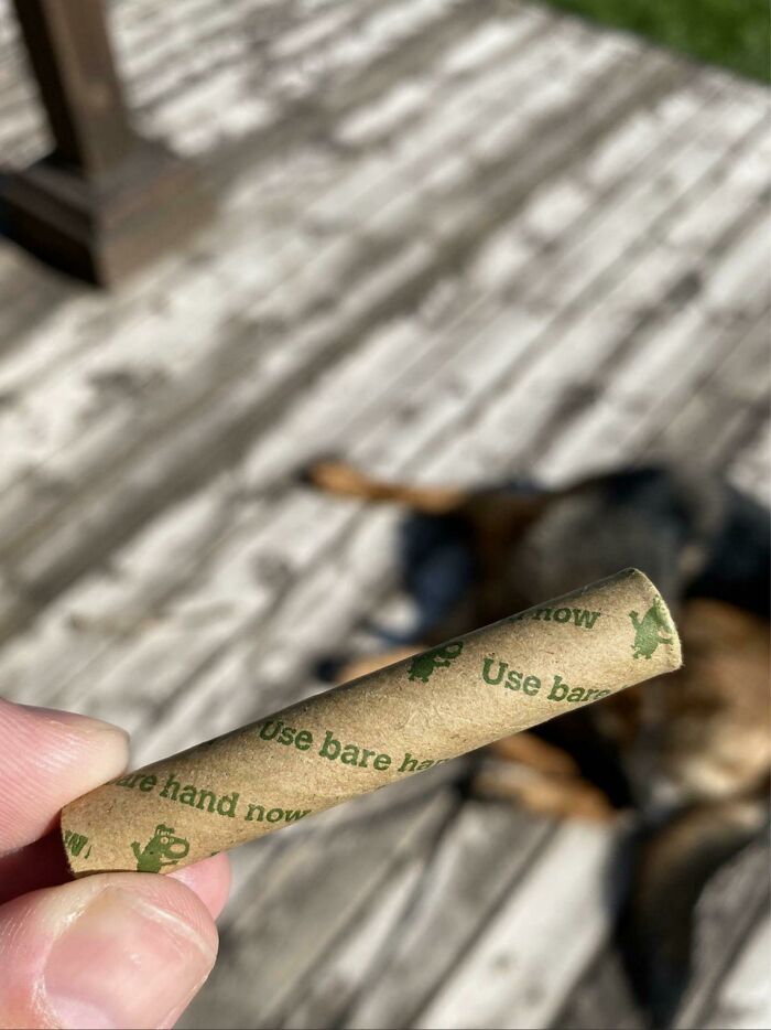 The Tube At The End Of A Roll Of Doggie Poo Bags Says "Use Bare Hand Now"