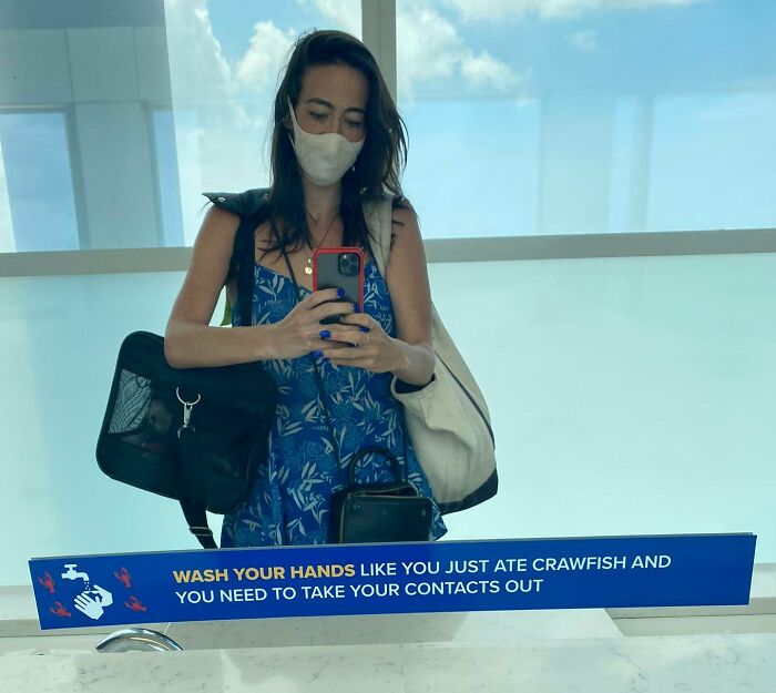 Sign In The New Orleans Airport Bathroom