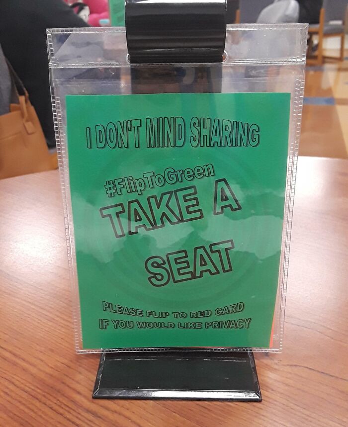 College Has These Signs On The Cafeteria Tables, It Flips To Red If You Don't Want Strangers Sitting At Your Table
