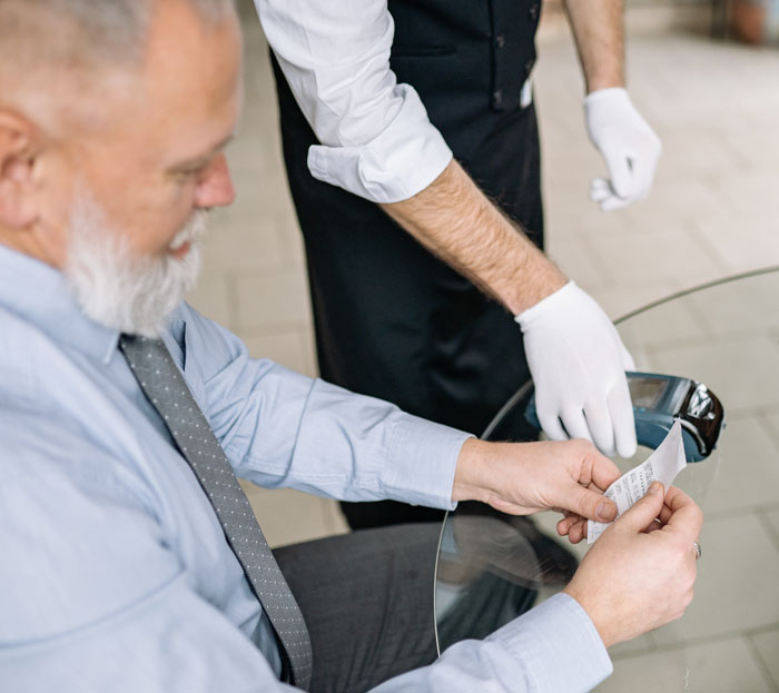 Person holding check