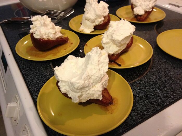 Slices of dessert topped with whipped cream on yellow plates, illustrating things you may not think of doing but committing a crime.