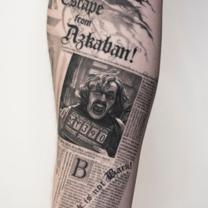 Harry Potter tattoo featuring an Azkaban escapee newspaper design with a prison photo and text.