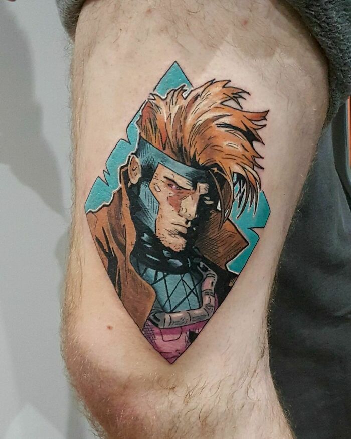 Marvel tattoo of a comic character with brown hair on an arm.